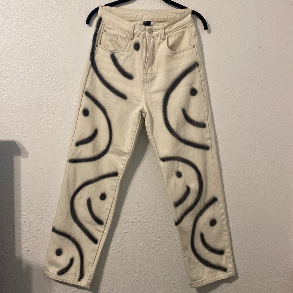 Cider straight leg smiley face graffiti jeans